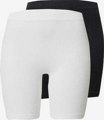 Pantaloni modelatori de la Lindex pe negru: față