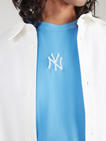 NEW ERA - Camiseta 'NEYYAN' en azul