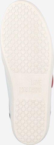 Baskets basses 'CASSE' Love Moschino en blanc