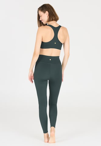 Athlecia Skinny Sports trousers 'FRANZ' in Green