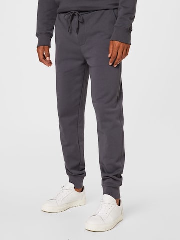 Calvin Klein Jeans Zúžený Kalhoty – šedá: přední strana