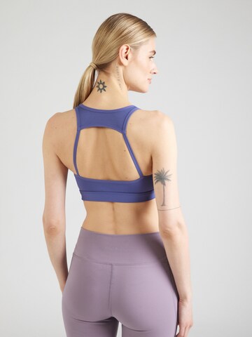 PUMA - Soutien Bustier Soutien de desporto 'MOVE STRONG' em azul: atrás