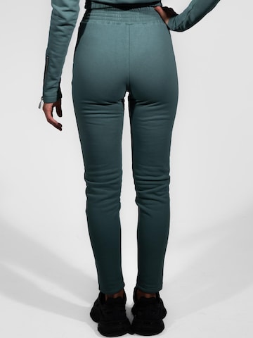 mandragora Slimfit Hose 'Cudowronka' in Grün