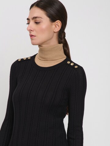 Influencer Sweter w kolorze czarny