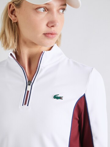 Lacoste Sport Bluzka sportowa 'NIY' w kolorze biały