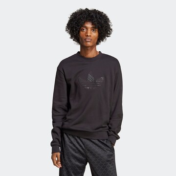 ADIDAS ORIGINALSSweater majica 'Graphics Monogram Crew' - crna boja: prednji dio