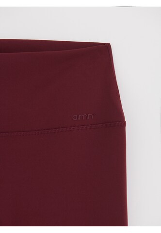 Skinny Pantaloni sportivi 'Sense' di Aim'n in rosso