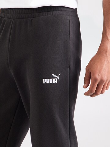 PUMA Tapered Sportbroek 'ESS No. 1' in Zwart