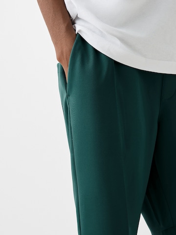 Bershka Szeroka nogawka Spodnie w kolorze zielony