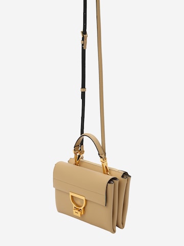 Coccinelle Handbag 'ARLETTIS' in Beige