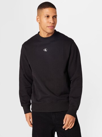 Calvin Klein Jeans - Sweatshirt em preto: frente