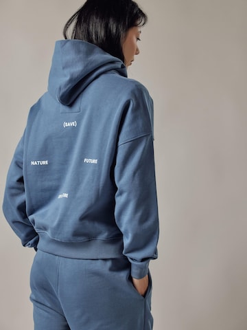 OWN Off With Nature Sweatshirt 'Cappuccio' i blå