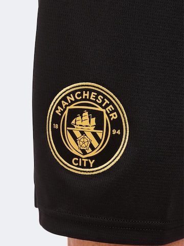 PUMA Loosefit Urheiluhousut 'MCFC' värissä musta
