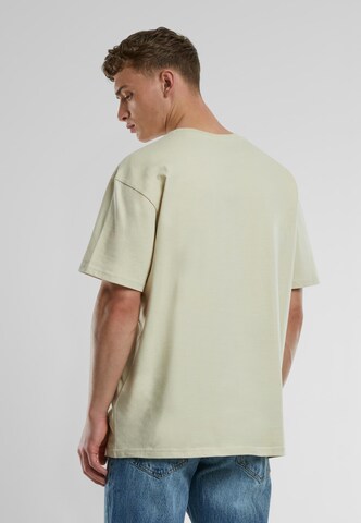 Urban Classics - Camiseta 'Cursive Bold' en beige