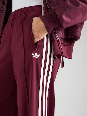 ADIDAS ORIGINALS Voľný strih Nohavice 'Firebird' - Červená