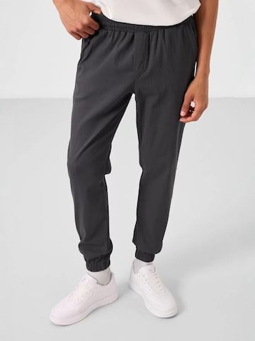 Regular Pantalon chino Tommy Life en gris
