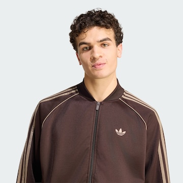 ADIDAS ORIGINALS - Chaqueta de entretiempo 'SST TT' en oro
