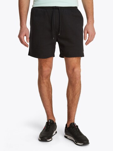 Tommy Jeans Loose fit Trousers in Black: front