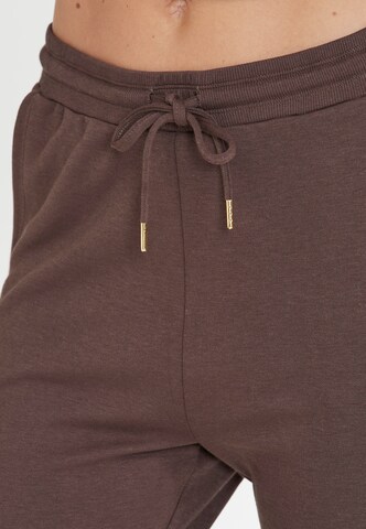 Athlecia Loose fit Workout Pants 'NIARY' in Brown