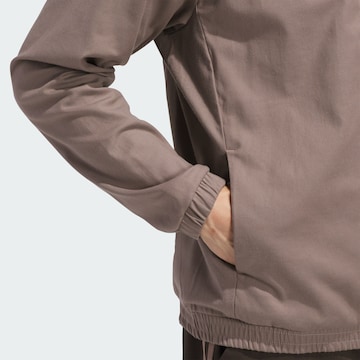 Veste de sport ADIDAS PERFORMANCE en marron