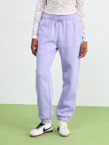 Nike Sportswear Конический (Tapered) Штаны 'PHNX FLC' в Лиловый: спереди