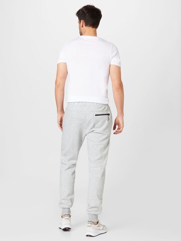 Champion Authentic Athletic Apparel Tapered Hose in Grau