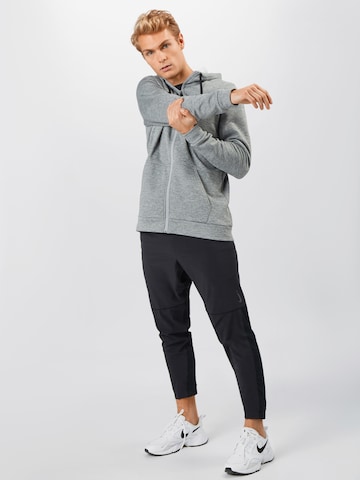 NIKE Sportsweatjacke 'Therma' in Grau