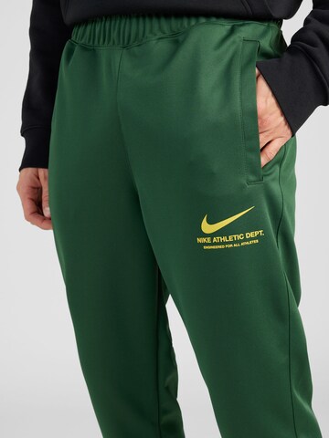 Effilé Pantalon Nike Sportswear en vert