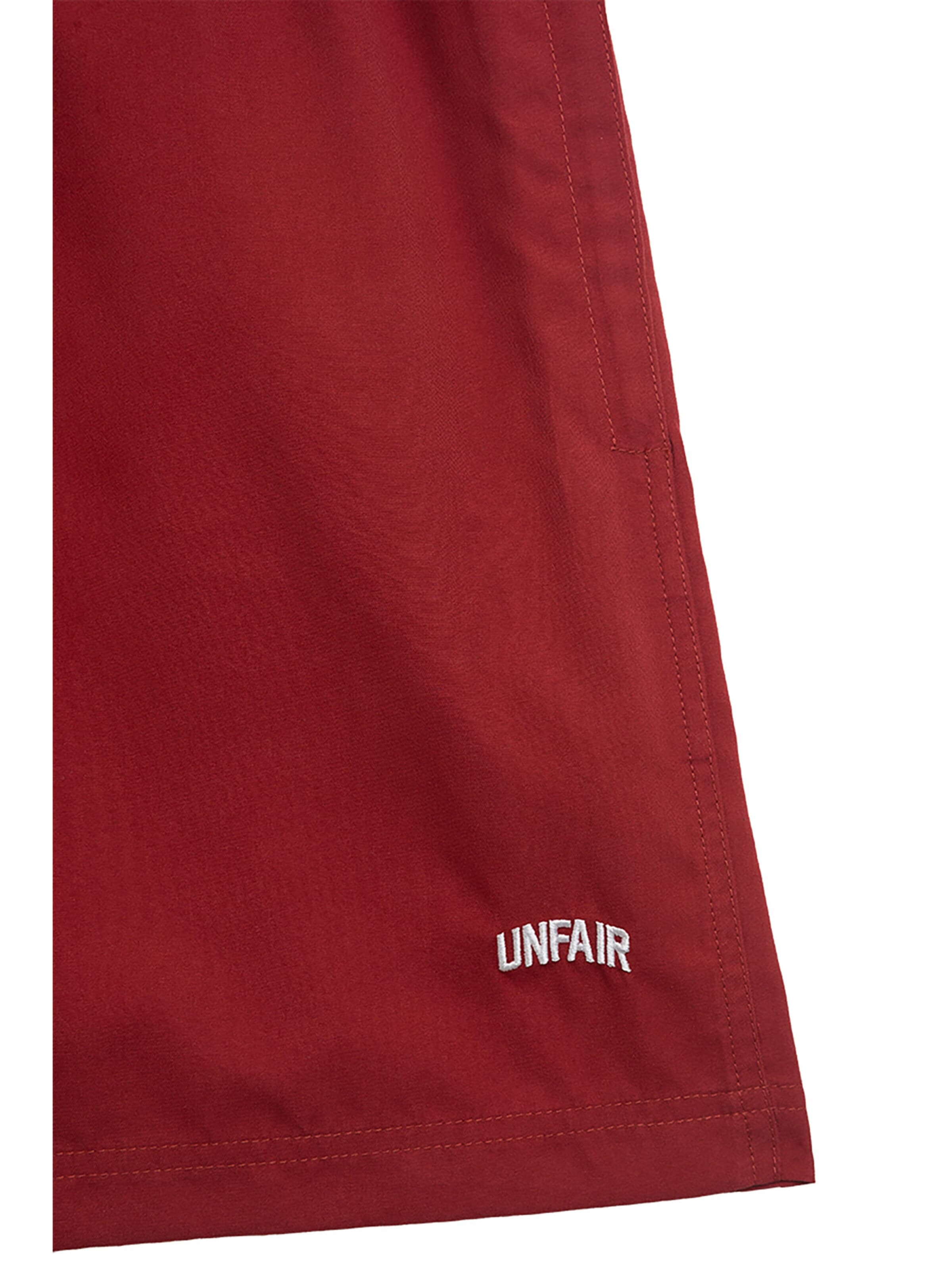 Shorts de bain Unfair Athletics en rouge