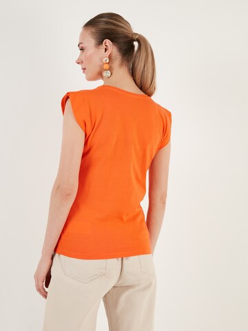 Maglietta di LELA in arancione