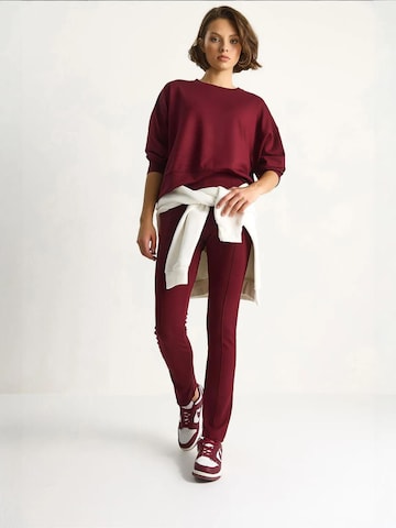 Tuta da jogging di Bianco Lucci in rosso