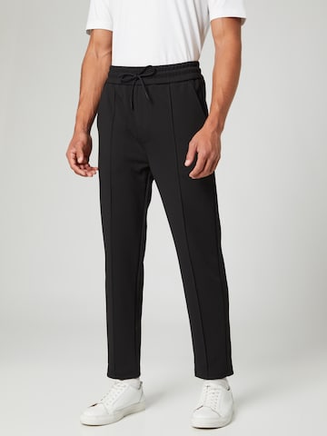Guido Maria Kretschmer Men Trousers with creases 'Enno' in Black: front