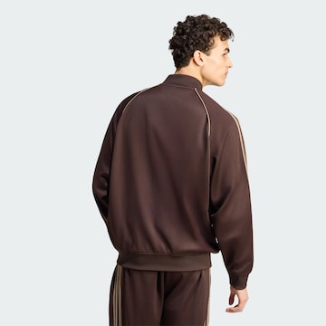 ADIDAS ORIGINALS - Chaqueta de entretiempo 'SST TT' en oro