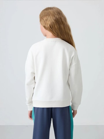 Tommy Life - Sweatshirt em castanho