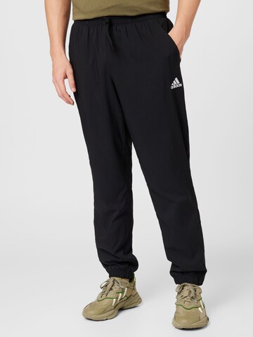 ADIDAS SPORTSWEAR Tapered Workout Pants 'Essentials Stanford' in Black: front