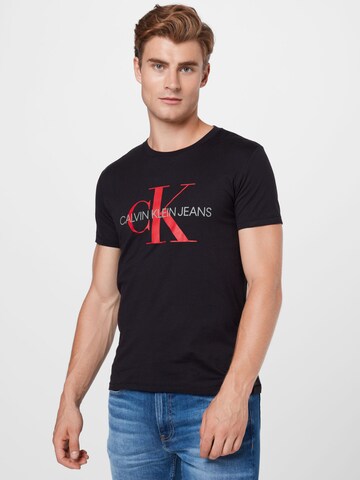 Coupe regular T-Shirt Calvin Klein Jeans en noir : devant