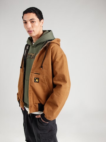 Carhartt WIP Overgangsjakke '50 Years Anniversary' i brun