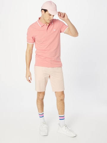 LEVI'S ® Poloshirt 'Slim Housemark Polo' in Rot