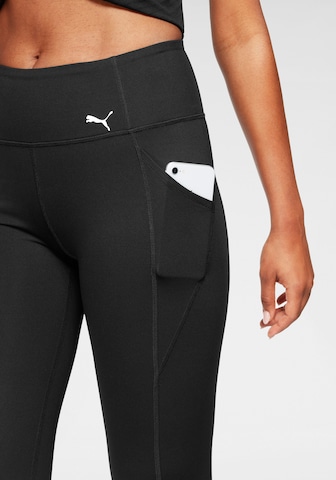 Skinny Pantaloni sportivi di PUMA in nero