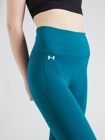 UNDER ARMOUR Skinny Sportovní kalhoty 'Motion' – modrá