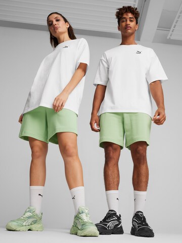 PUMA tavaline Püksid 'BETTER CLASSICS', värv roheline: eest vaates