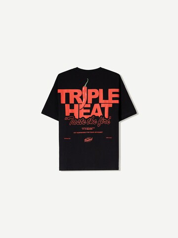 Tricou supradimensional de la Bershka pe negru
