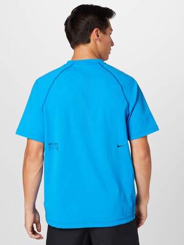 T-Shirt fonctionnel 'Axis' NIKE en bleu