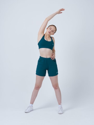 SPORTKIND Loosefit Sportbroek 'Bermuda Shorts' in Groen