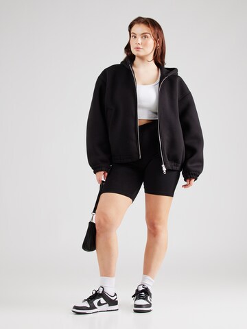 ONLY Carmakoma Skinny Leggingsit 'Time' värissä musta