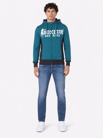 Boxeur des Rues - Sudadera 'Herren Hoodie Fitted Boxeur des Rues mit Reißverschluss und Kapuze, Petrolblau, Weißes Logo, Baumwolle' en azul