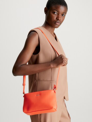 Calvin Klein Crossbody Bag 'Must' in Orange: front