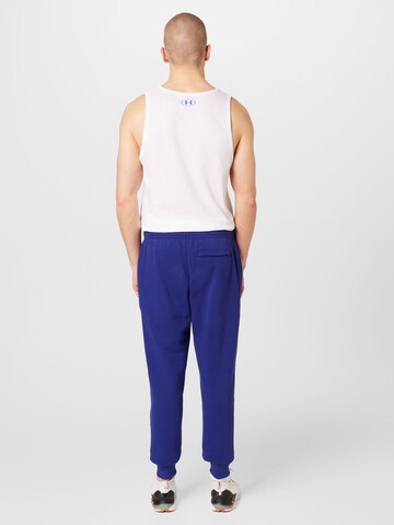 Effilé Pantalon de sport 'Rival' UNDER ARMOUR en bleu