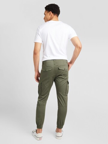 QS Alt kitsenev Klapptaskutega püksid, värv roheline