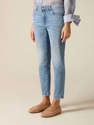 Skinny Jean oltre en bleu